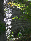 The northeast buttress wall, seen from the stream level