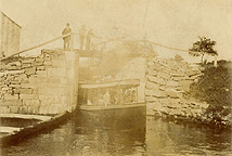 Boat exiting a canal lock