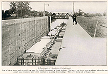 Image of old canalboats in a lock