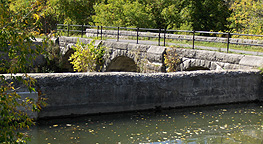 Looking northwest at the arches which support the towpath