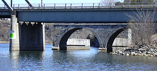 Rexford Aqueduct, looking east at the southern segment behind the Route 146 
          bridge